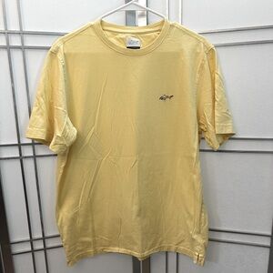 Greg Norman brand mens t shirt. Size medium. Yellow.